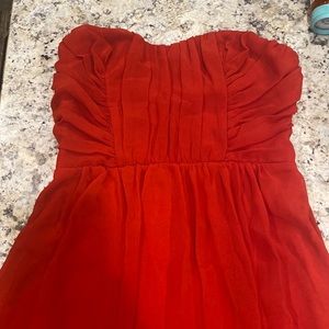 Pretty red dress.